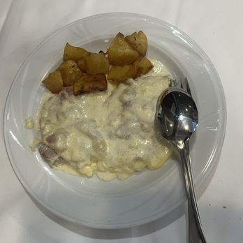 Da Cesari - Scalloping with cheese, Parma ham and roasted potatoes - Italian Near Me - Bologna, BO