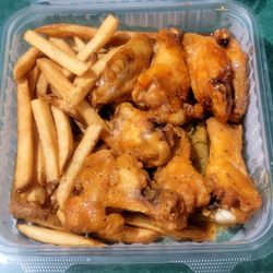 It's Just Wings - Garlic parm & Sweet Chili bone-in wings with fries.