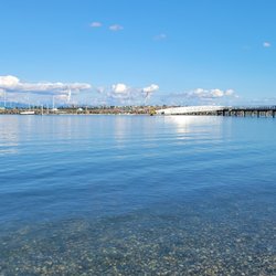 Seafarers Memorial Park - The foreground shows very clear water. The distance is a walkway to a temporary moorage