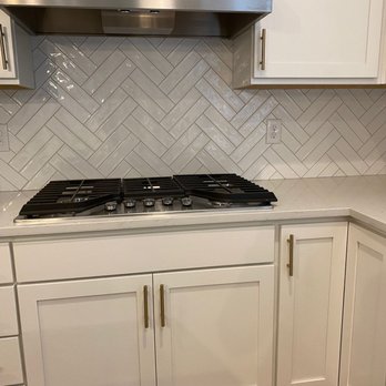 Shine Tile - a clean kitchen with white cabinets - Flooring Near Me Shine Tile - a clean kitchen with white cabinets - Flooring Near Me