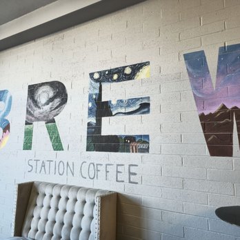 Brew Station Coffee - a coffee shop sign on a brick wall - Coffee & Tea Near Me - Tucson, Arizona
