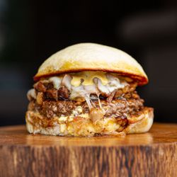 Flip 'n Patties - Energy Corridor - Puet Wagyu Burger. Topped with Filipino chopped smoked pork butt.