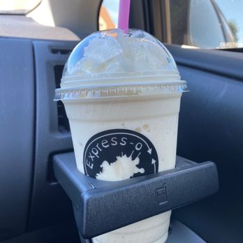 Express-o Yourself - a cup of iced coffee in a car - Coffee & Tea Near Me - Enumclaw, Washington Express-o Yourself - a cup of iced coffee in a car - Coffee & Tea Near Me - Enumclaw, Washington