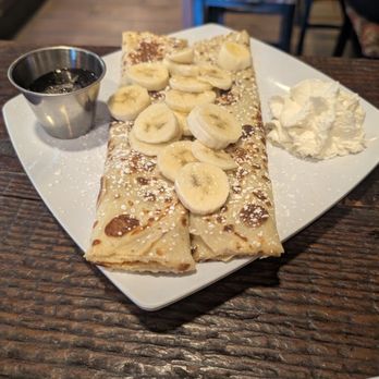 Crepissima - Pancake crepes with bananas whipped cream and syrup. - Creperies Near Me - Valencia, California Crepissima - Pancake crepes with bananas whipped cream and syrup. - Creperies Near Me - Valencia, California