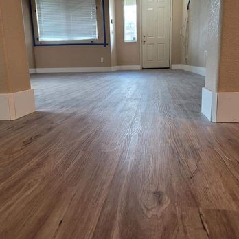 Vince Parker Flooring - a hardwood floor in a home - Carpet Installation Near Me Vince Parker Flooring - a hardwood floor in a home - Carpet Installation Near Me