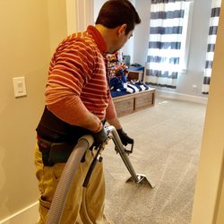 MegaCleaners - Carpet cleaning service in action