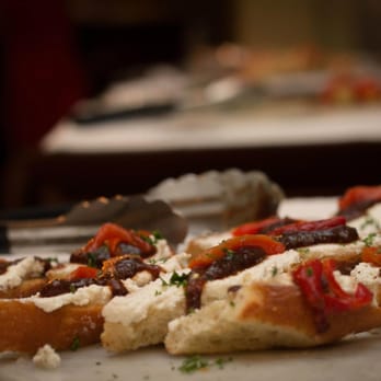 La Bodega - Pintxos de Higo: Roasted red peppers, goat cheese and a fig coulis on grilled bread {photo from our wedding} - Tapas Bars Near Me - Kansas City, Missouri
