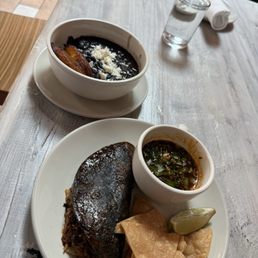 Birria quesadilla and black beans and plantains Birria quesadilla and black beans and plantains
