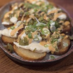 99 Bar Saloon - Potato nachos. Not bad!