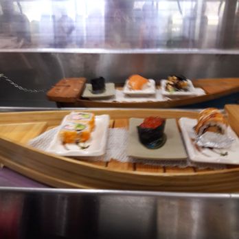 Kobe Sushi Buffet - Sushi on a boat food on a Merry-Go-Round how good is that sit at the bar and let those boats pass you by and pick out what you like the best - Sushi Bars Near Me - Modesto, California Kobe Sushi Buffet - Sushi on a boat food on a Merry-Go-Round how good is that sit at the bar and let those boats pass you by and pick out what you like the best - Sushi Bars Near Me - Modesto, California
