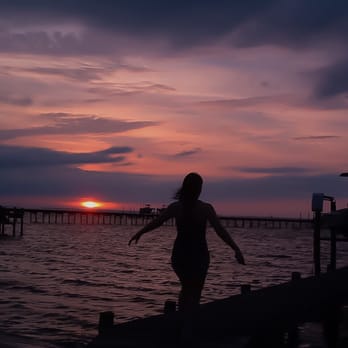 Fickling Vacation Rentals - My daughter walking on the pier at the Turpentine property - Vacation Rentals Near Me - St. George Island, Florida Fickling Vacation Rentals - My daughter walking on the pier at the Turpentine property - Vacation Rentals Near Me - St. George Island, Florida