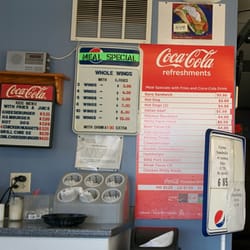 More menus (food and prices are scattered all over the walls and windows)
