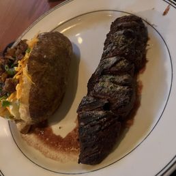 Hanger steak with loaded potato which also