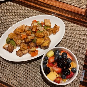Roanoke - Breakfast potatoes and fresh fruit. - Cocktail Bars Near Me - Chicago, Illinois