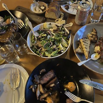 The Ballard Cut - baby gem salad, flank iron salad, beef taretare, bread service, bone in pork chop - New American Near Me - Seattle, Washington The Ballard Cut - baby gem salad, flank iron salad, beef taretare, bread service, bone in pork chop - New American Near Me - Seattle, Washington
