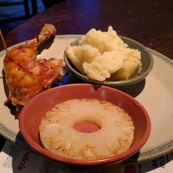 Nando's - Quarter chicken, BBQ flavor. Side of grilled pineapple and mashed potatoes. - Fast Food Near Me - Belfast, BFS