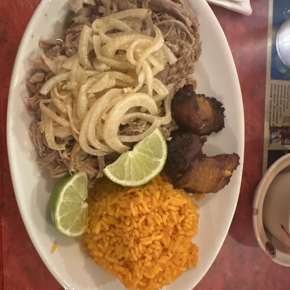 The #1, pulled pork yellow rice and fried plantains. The #1, pulled pork yellow rice and fried plantains.