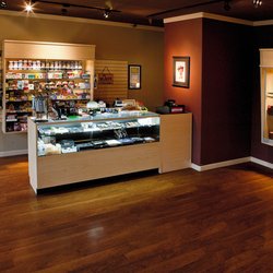 Fumare Smoke Shop & Fine Cigars - Fumare_Cigar_Counter_and_Glass_Display