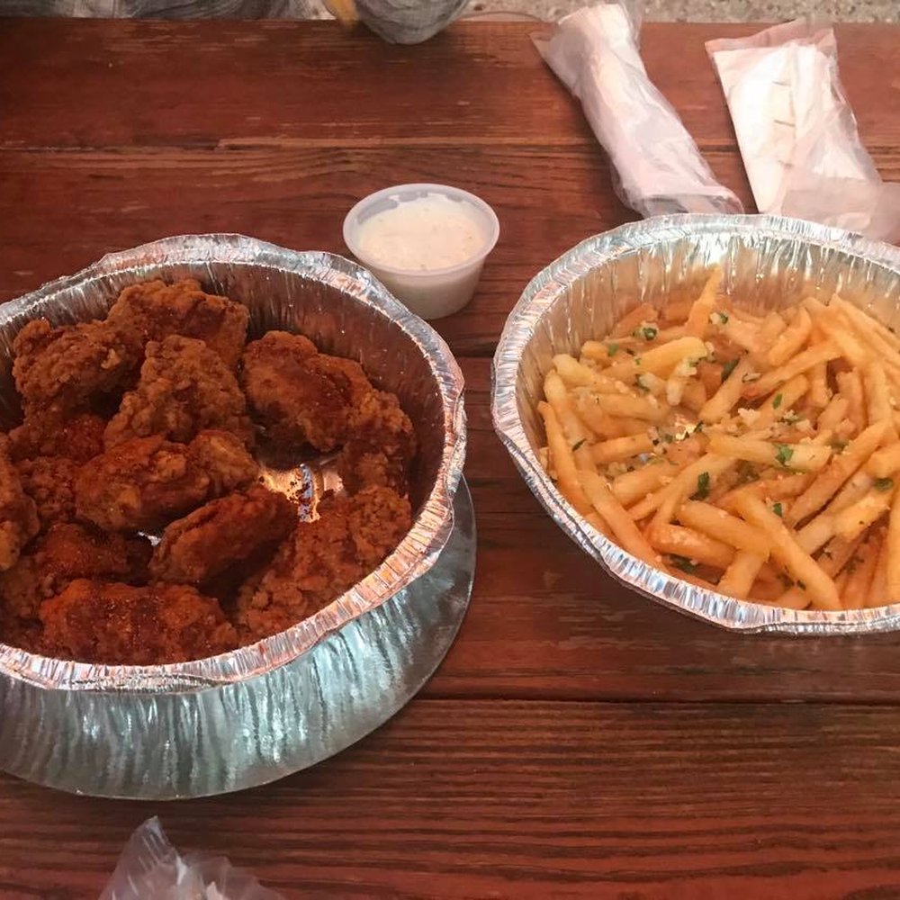 The Backyard - Cajun Dry Rub Boneless Wings and Garlic Truffle Parmesan Fries - American Near Me - Seabrook, Texas The Backyard - Cajun Dry Rub Boneless Wings and Garlic Truffle Parmesan Fries - American Near Me - Seabrook, Texas