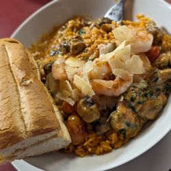 Pizza Palace - Mushroom harvest medley sauce over seasoned Spanish rice instead of pasta with shrimp added