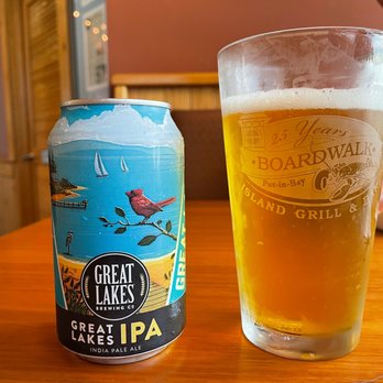 The Boardwalk - a glass of beer and a can of great lakes ipa - Seafood Near Me - Put In Bay, Ohio The Boardwalk - a glass of beer and a can of great lakes ipa - Seafood Near Me - Put In Bay, Ohio