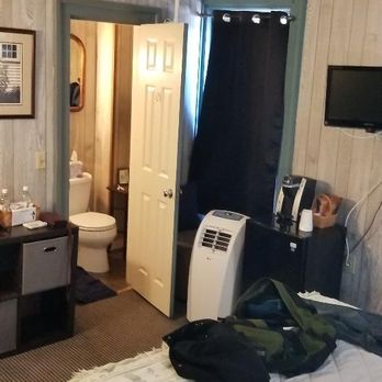 Old Village Inn - Smaller of the 2 rooms - portable AC. Sink not shown outside of the bathroom. - Desserts Near Me - Ogunquit, Maine Old Village Inn - Smaller of the 2 rooms - portable AC. Sink not shown outside of the bathroom. - Desserts Near Me - Ogunquit, Maine