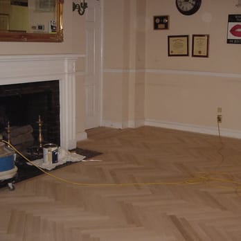 Norwegian Wood - a room with a fireplace and a mirror - Flooring Near Me - Bronx, New York Norwegian Wood - a room with a fireplace and a mirror - Flooring Near Me - Bronx, New York