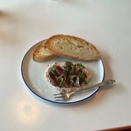 a plate of food with bread a plate of food with bread
