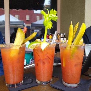O'Bricks - Three different takes on the Bloody Mary options!  Check out the pepperoni stick in the one on the left. - New American Near Me - Bradenton, Florida