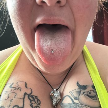 Untouchable Tattoos - This was 4 days after the fresh tongue piercing with the wrong barbell. - Tattoo Near Me - Hammond, Louisiana