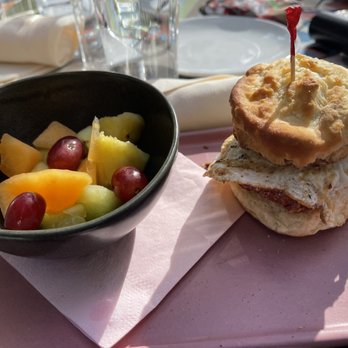 Buena Vida Tapas Bar - Pimentón Chicken Breakfast Sandwich & Fruit - Spanish Near Me - Atlanta, Georgia Buena Vida Tapas Bar - Pimentón Chicken Breakfast Sandwich & Fruit - Spanish Near Me - Atlanta, Georgia