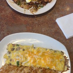 Scrambled Yolk - Corned beef hash Skillet & veggie omelette
