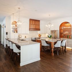 Wiles Design Group - A Mediterranean Ely, IA home with custom arches, warm walnut, expressive tile and family-focused spaces designed for effortless entertaining