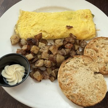 Kanela Breakfast Club - BYO Omelette with potatoes - Breakfast & Brunch Near Me - Chicago, Illinois Kanela Breakfast Club - BYO Omelette with potatoes - Breakfast & Brunch Near Me - Chicago, Illinois