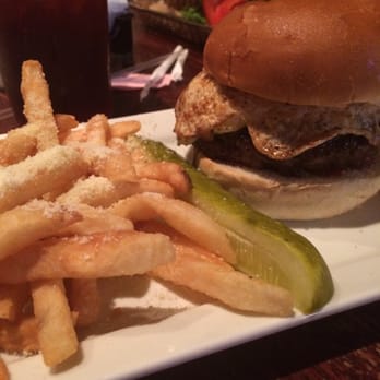 Hops Burger Bar - 8oz burger with mayo, ketchup, cheddar, and fried egg. Served with parmesian and truffle oil fries. - Burgers Near Me - Greensboro, North Carolina