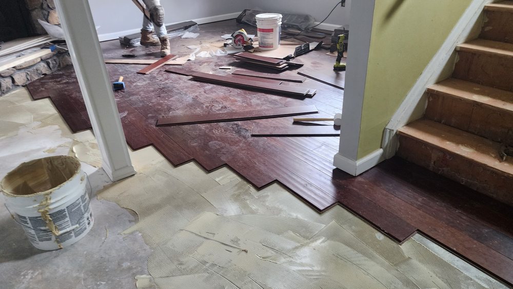 Slide of JS Roofing Group