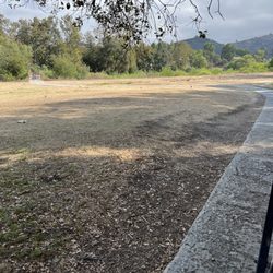 Castle Creek Country Club - Bumpy Cart path and brown tee box.