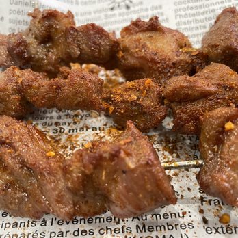Tasty Point - meat skewers on a newspaper - Hot Pot Near Me - Alameda, California Tasty Point - meat skewers on a newspaper - Hot Pot Near Me - Alameda, California