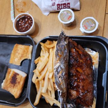 Nick's Barbecue - half slab of barbecue ribs french fries barbecue baked beans and garlic bread. - Barbeque Near Me - Homer Glen, Illinois Nick's Barbecue - half slab of barbecue ribs french fries barbecue baked beans and garlic bread. - Barbeque Near Me - Homer Glen, Illinois