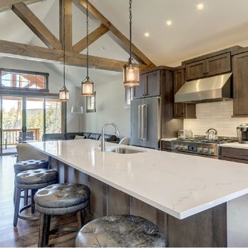 Kitchen Solvers - a large kitchen with a center island - General Contractors Near Me - Winnipeg, Manitoba Kitchen Solvers - a large kitchen with a center island - General Contractors Near Me - Winnipeg, Manitoba