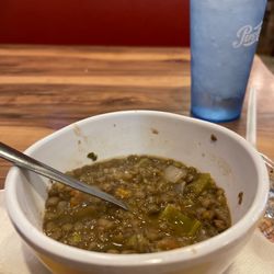 Mad Greek - Lentil soup. Looks like it was scraped from the bottom of a barrel and slopped in the bowl with with dirty sides
