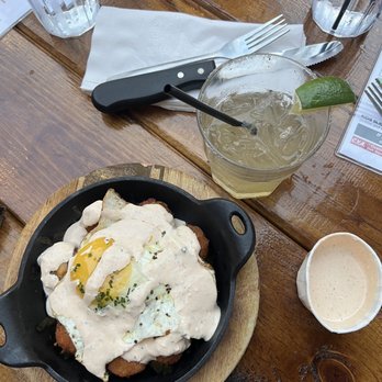 Rodeo Goat - a cast iron skillet with a fried egg on top - Burgers Near Me - Denton, Texas Rodeo Goat - a cast iron skillet with a fried egg on top - Burgers Near Me - Denton, Texas