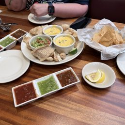 Three salsas and the Chile con Queso flight. Three salsas and the Chile con Queso flight.