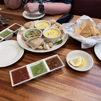 Abuelo's Mexican Restaurant - Three salsas and the Chile con Queso flight. - Mexican Near Me - Hurst, Texas Abuelo's Mexican Restaurant - Three salsas and the Chile con Queso flight. - Mexican Near Me - Hurst, Texas