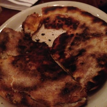 Johnny Carino's - My daughter tried her best to work around the burned ass pizza!! This is the bottom of it. sorry excuse for an Italian place!! - Italian Near Me - Downey, California Johnny Carino's - My daughter tried her best to work around the burned ass pizza!! This is the bottom of it. sorry excuse for an Italian place!! - Italian Near Me - Downey, California