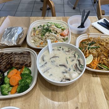 Kitchen Thai Express - Far left then clockwise: Crying tiger (w/sticky rice) Thai fried rice Chicken pad Thai Tom kha soup - Thai Near Me - St. George, Utah