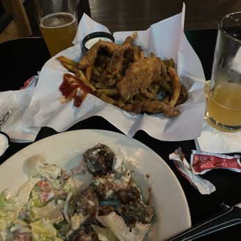 Lucky's Roadhouse - Half eaten wedge salad and we dropped in their steak bites with melted blue cheese and the other is chicken strips with fries. - Bars Near Me - Vancouver, Washington Lucky's Roadhouse - Half eaten wedge salad and we dropped in their steak bites with melted blue cheese and the other is chicken strips with fries. - Bars Near Me - Vancouver, Washington