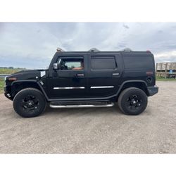 King Auto - 2005 Hummer H2