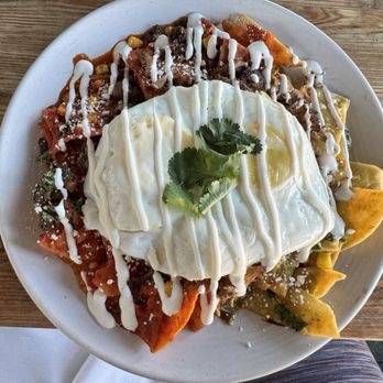 Pablo y Pablo - Chilaquiles red/green with pork carnitas - Mexican Near Me - Seattle, Washington Pablo y Pablo - Chilaquiles red/green with pork carnitas - Mexican Near Me - Seattle, Washington