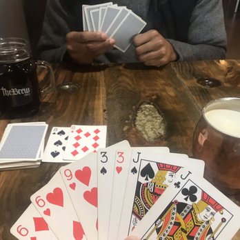 The Brew Cafe - Cards and coffee date with my love! Nitro for me and cold brew for him. Who is going to win this rummy hand?! - Coffee & Tea Near Me - Lansing, Michigan